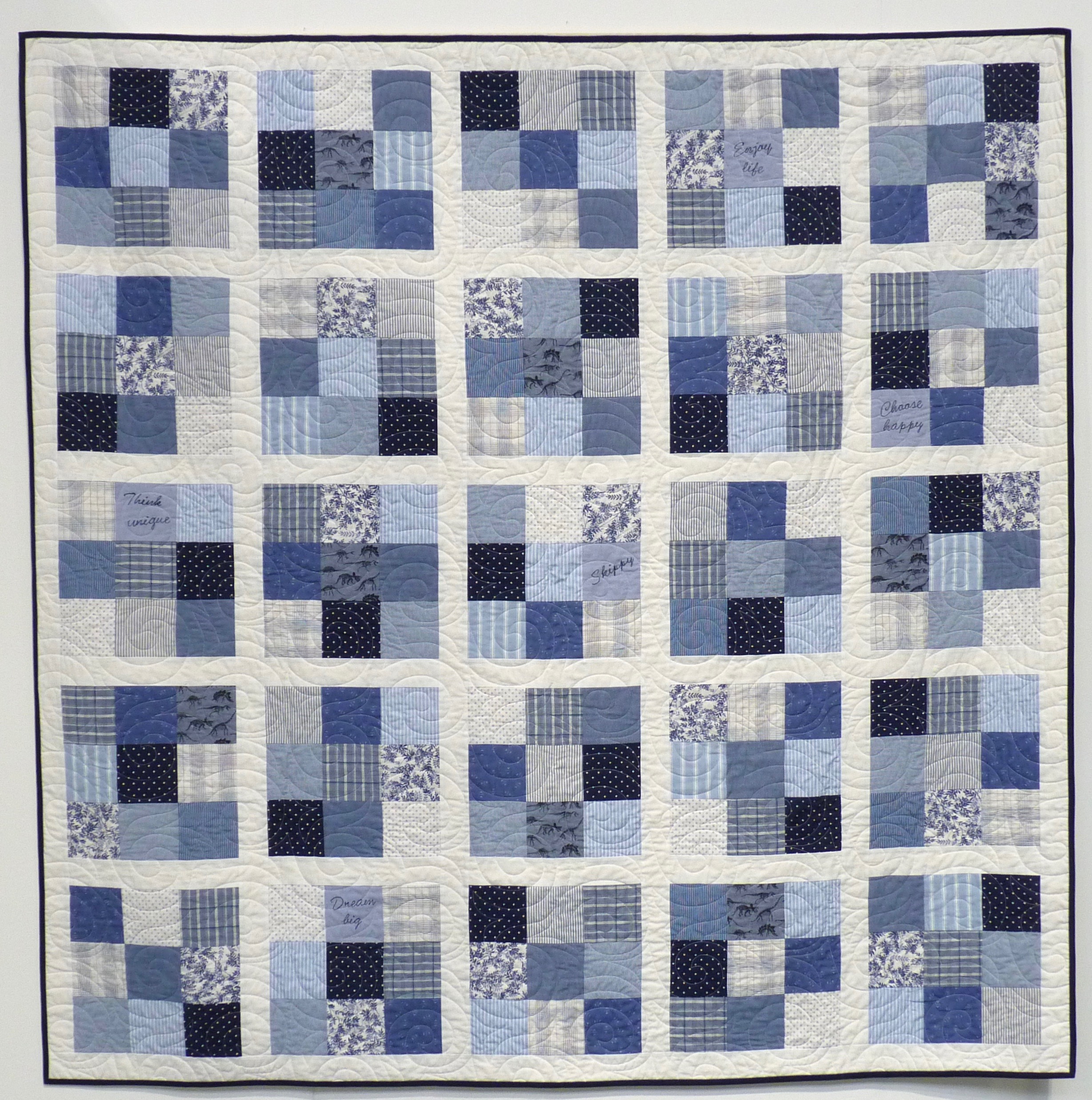 Quilt made from upcycled blue and white shirts