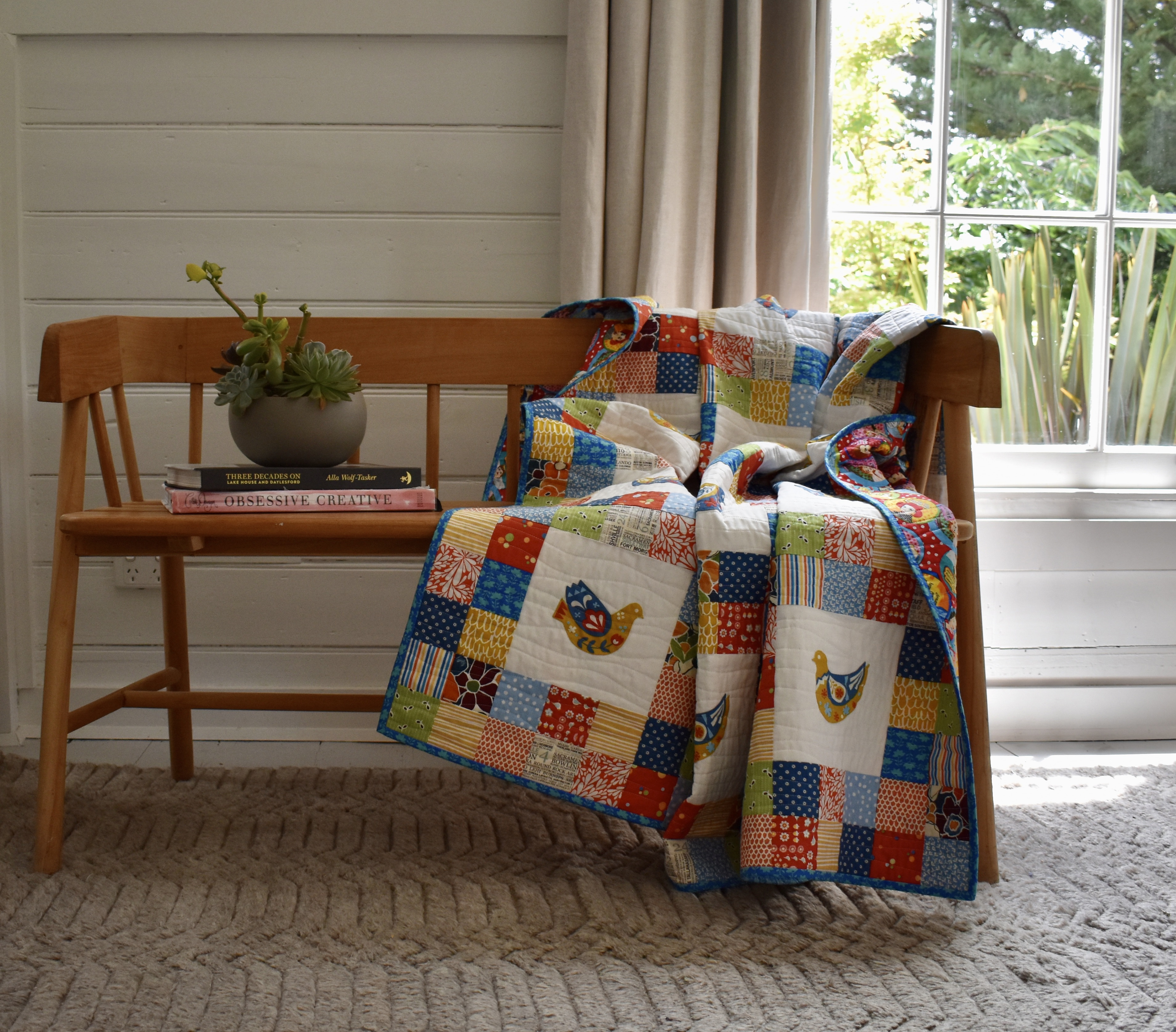 Scandi bird patchwork quilt