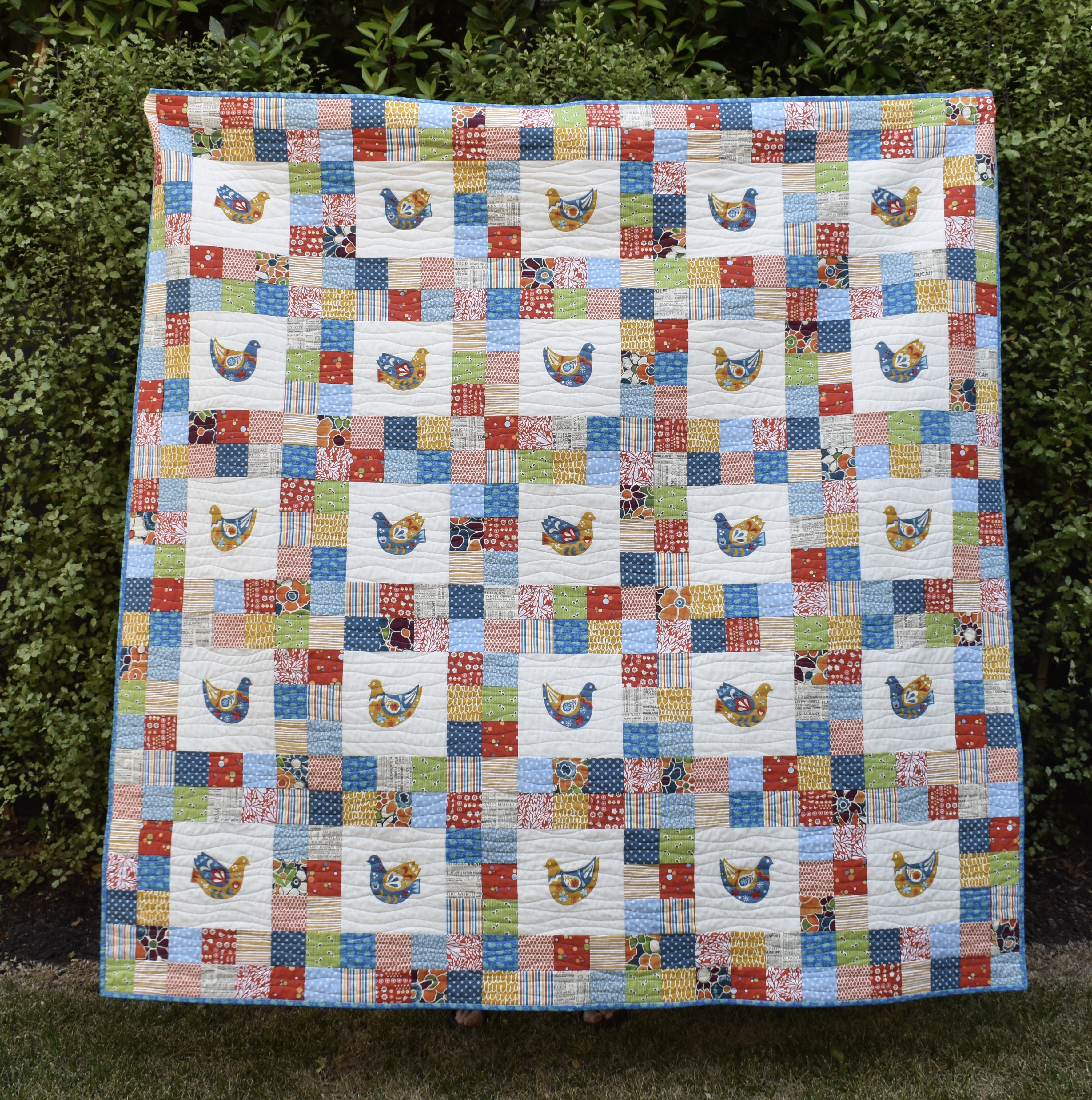 Scandi bird patchwork quilt