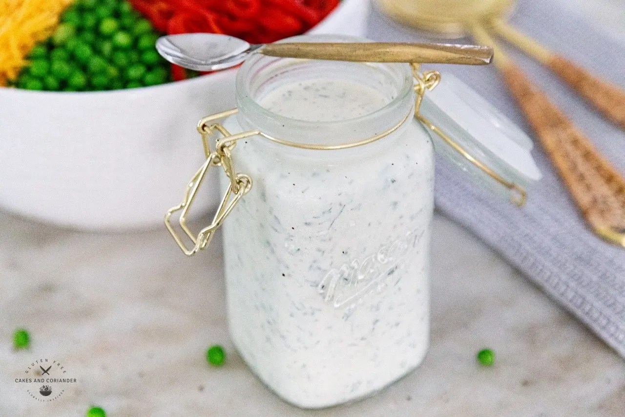 Easy Make at Home: Rustic Yogurt and Buttermilk Ranch Dressing recipe with a salad in the background