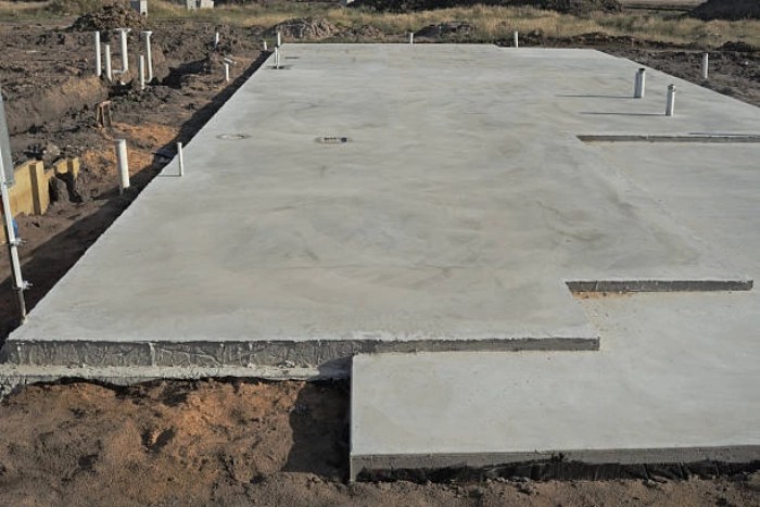 Professional concrete slab installation by Calif Construction in California