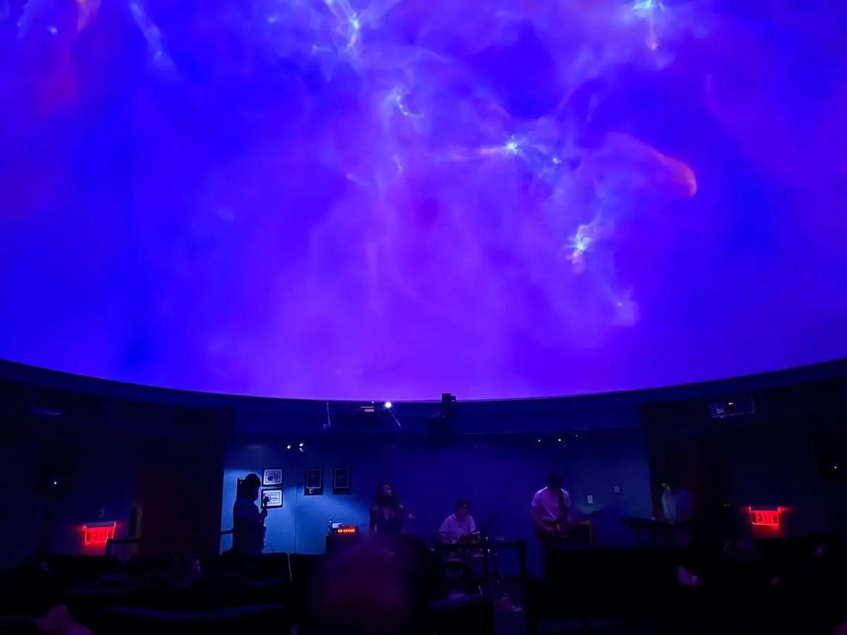 Calling From Pluto shines at album release concert in Edelman Planetarium