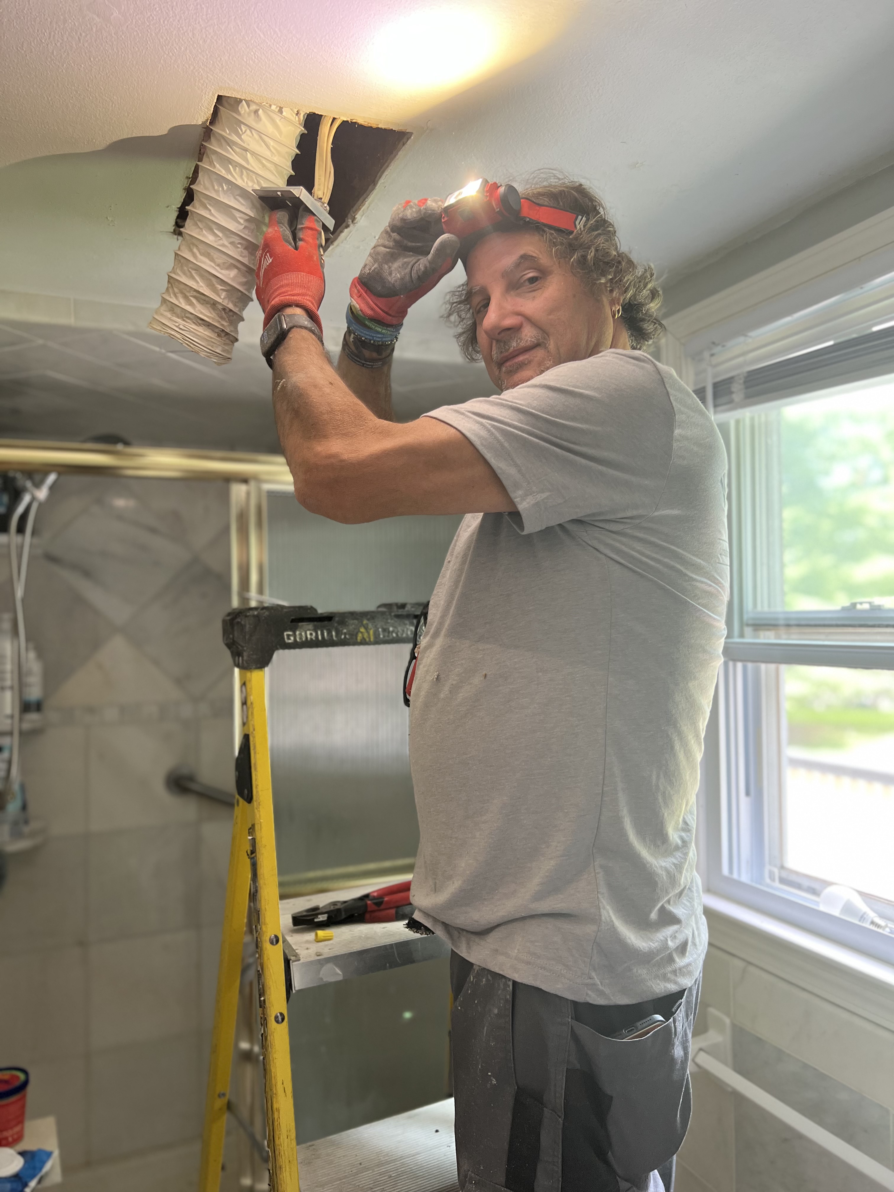 Kato Electric master electrician working in a Connecticut home