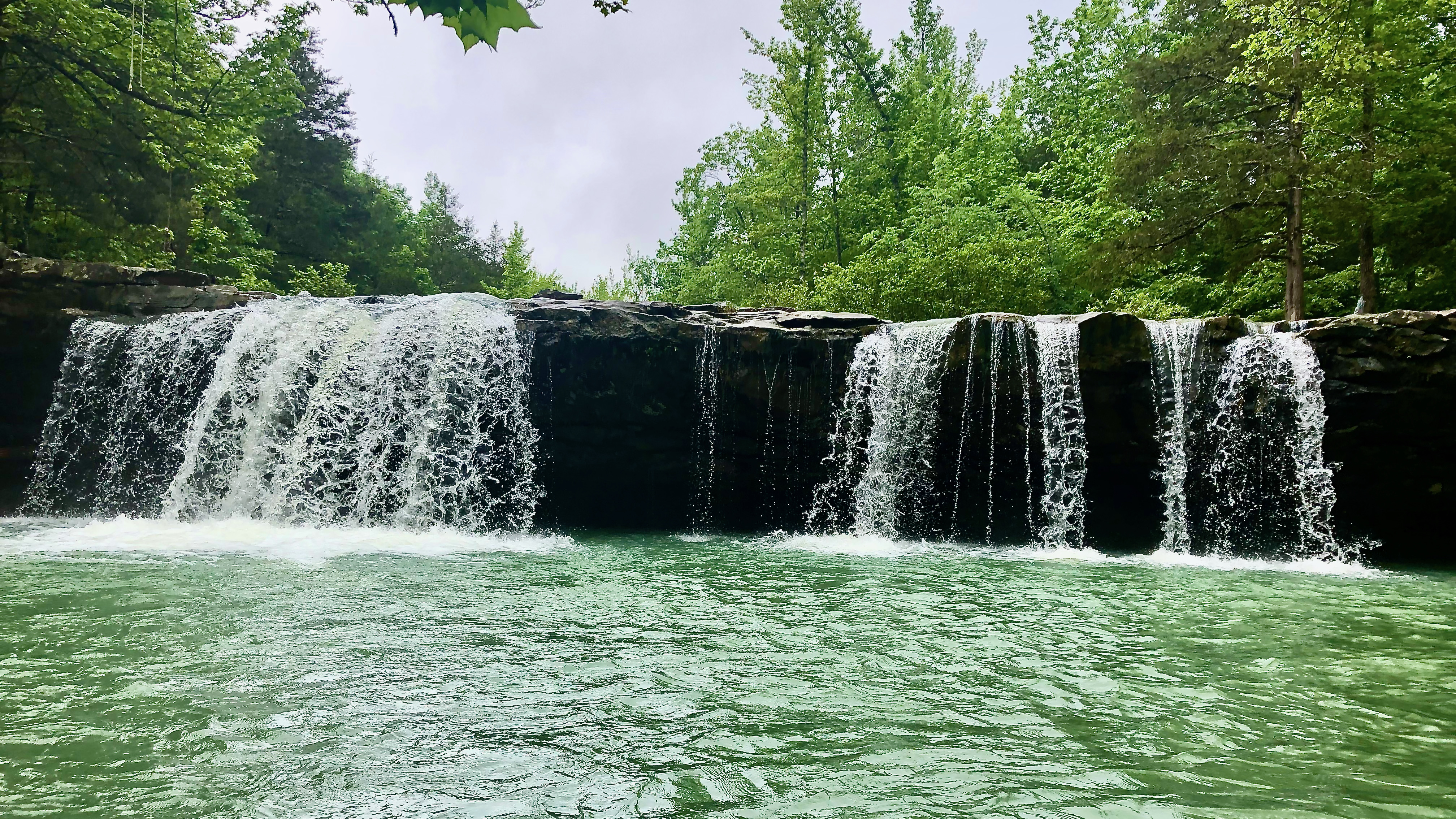 a 3 stream waterfall and rocks in arkansas