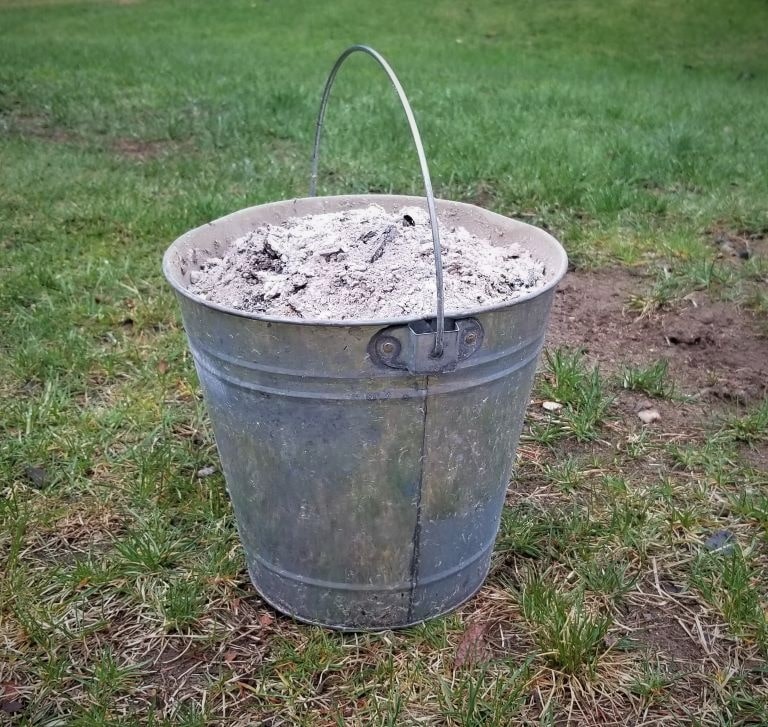 21 practical uses for fire pit ashes at the campsite or at home