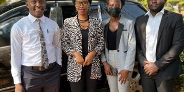 Barbie Kyagulanyi with some of the event's oragnisers awaiting entry into UCU