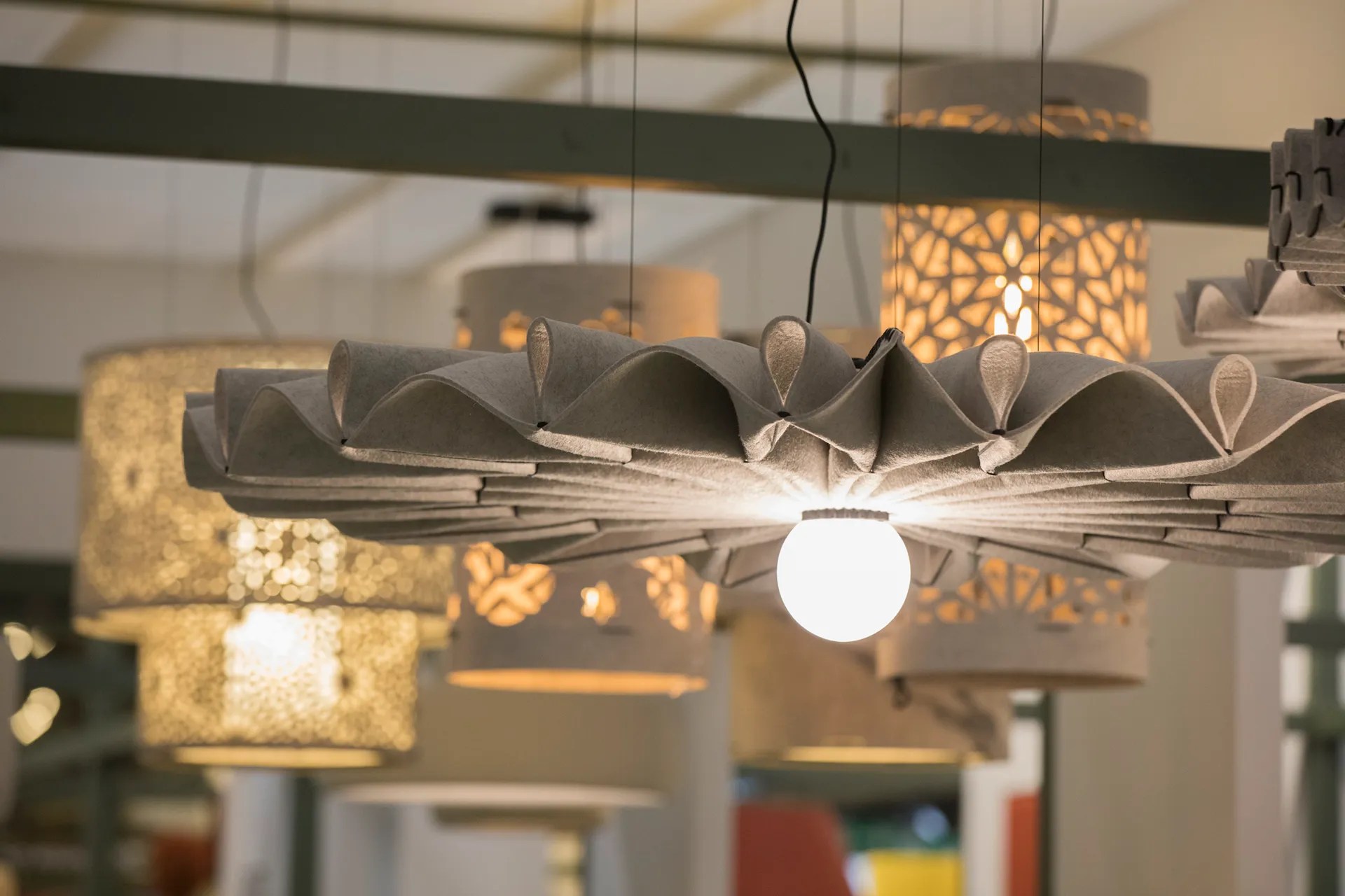 Office accessories such as organizers, lighting fixtures, and decorative items enhancing workspace functionality.