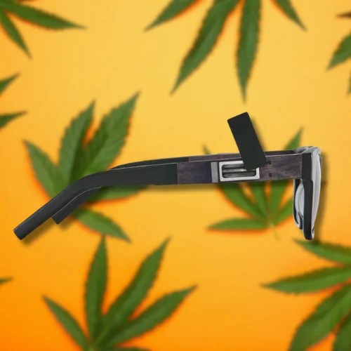smoking shades pipe on an orange background with cannabis leaves