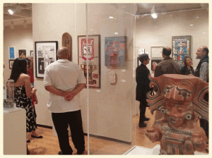 Visitors take in a recent exhibition at the Beth K. Stocker Art Gallery at Lorain County Community College’s Stocker Arts Center. Photo courtesy of Stocker Arts Center.