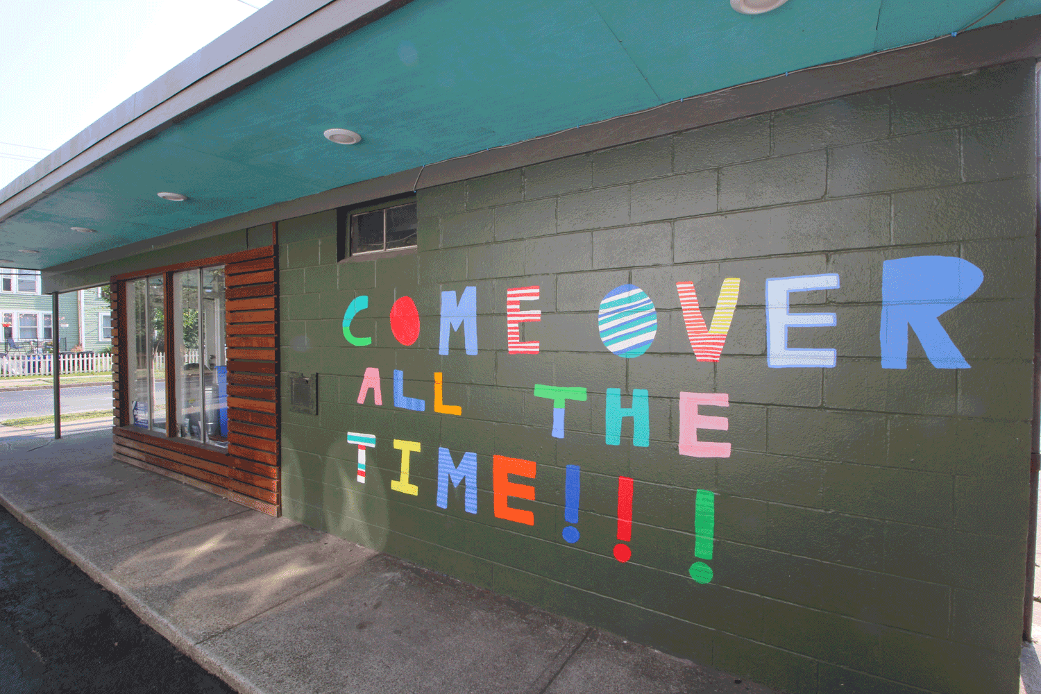 Erin Guido’s text-based work can be found on walls outside of Phoenix Coffee in Ohio City.