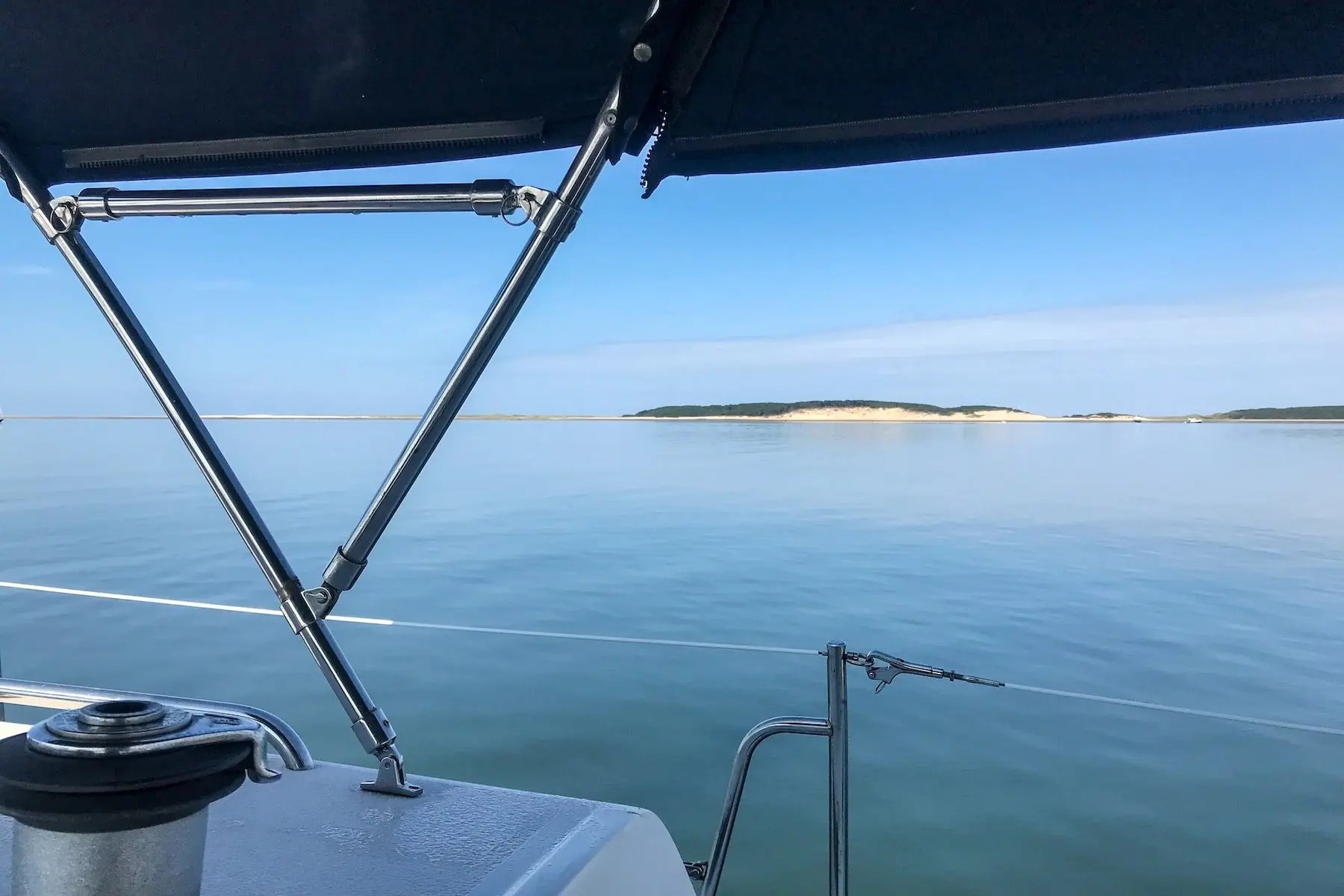 View of the Wellfleet shoreline from a Cape Cod Catamaran charter