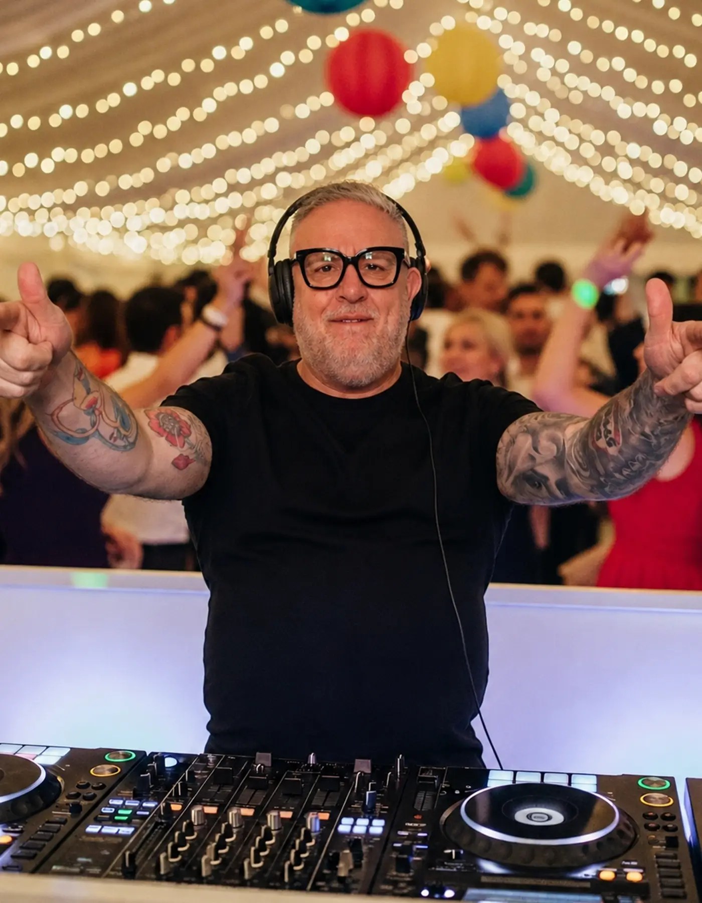 Carl Mitchell providing DJ hire in Sutton Coldfield with guests enjoying a packed dance floor.