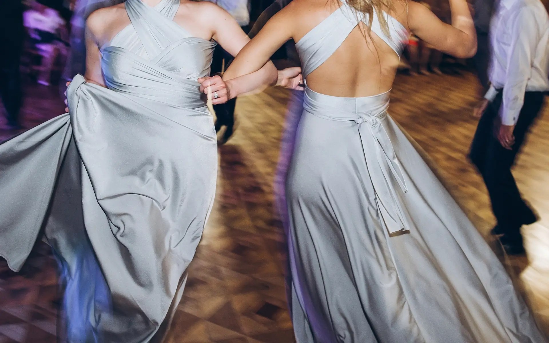 Wedding guests dancing on the dance floor at a wedding celebration in Sutton Coldfield.