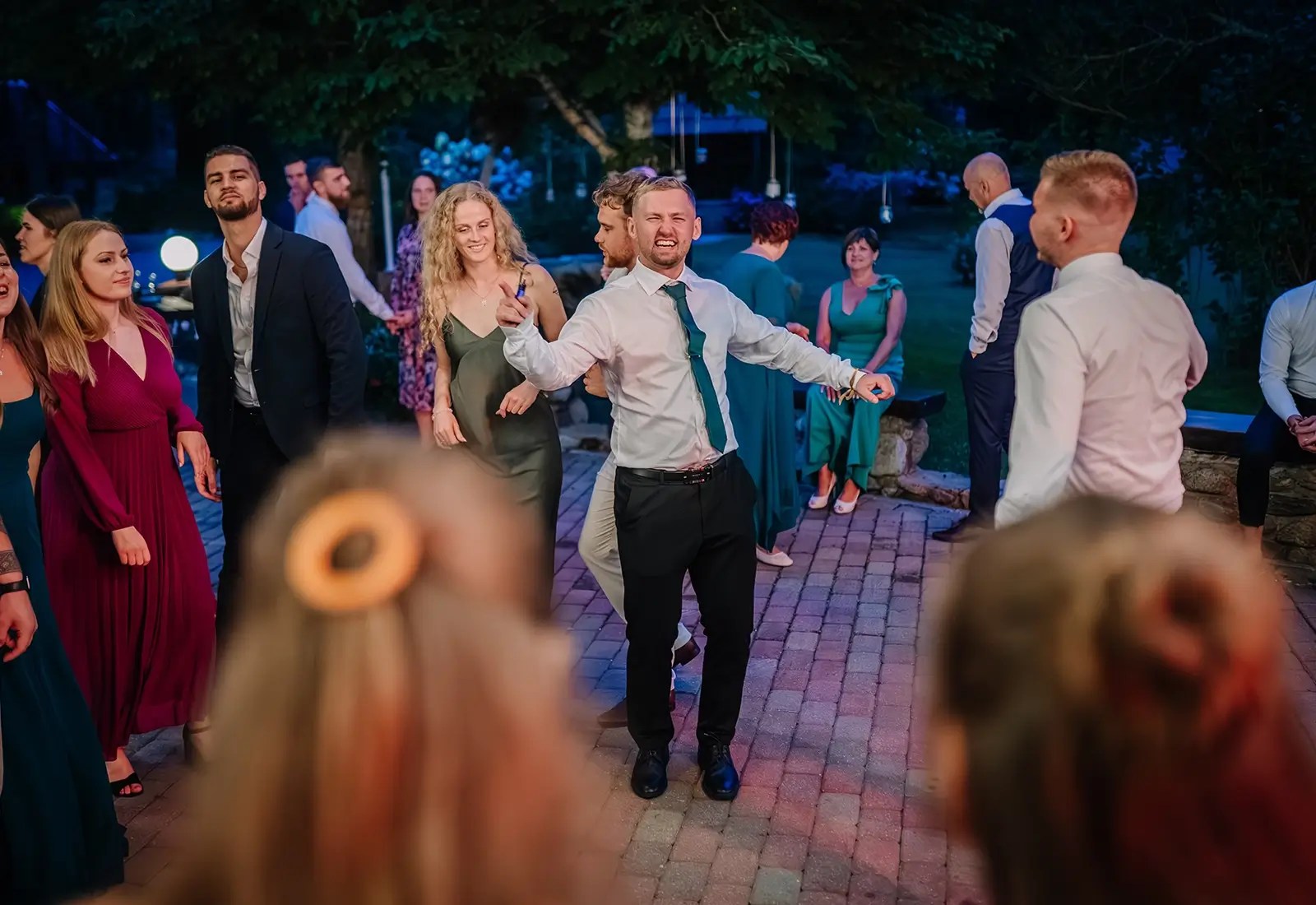 Wedding guests celebrating with Carl Mitchell providing wedding DJ hire in Solihull.
