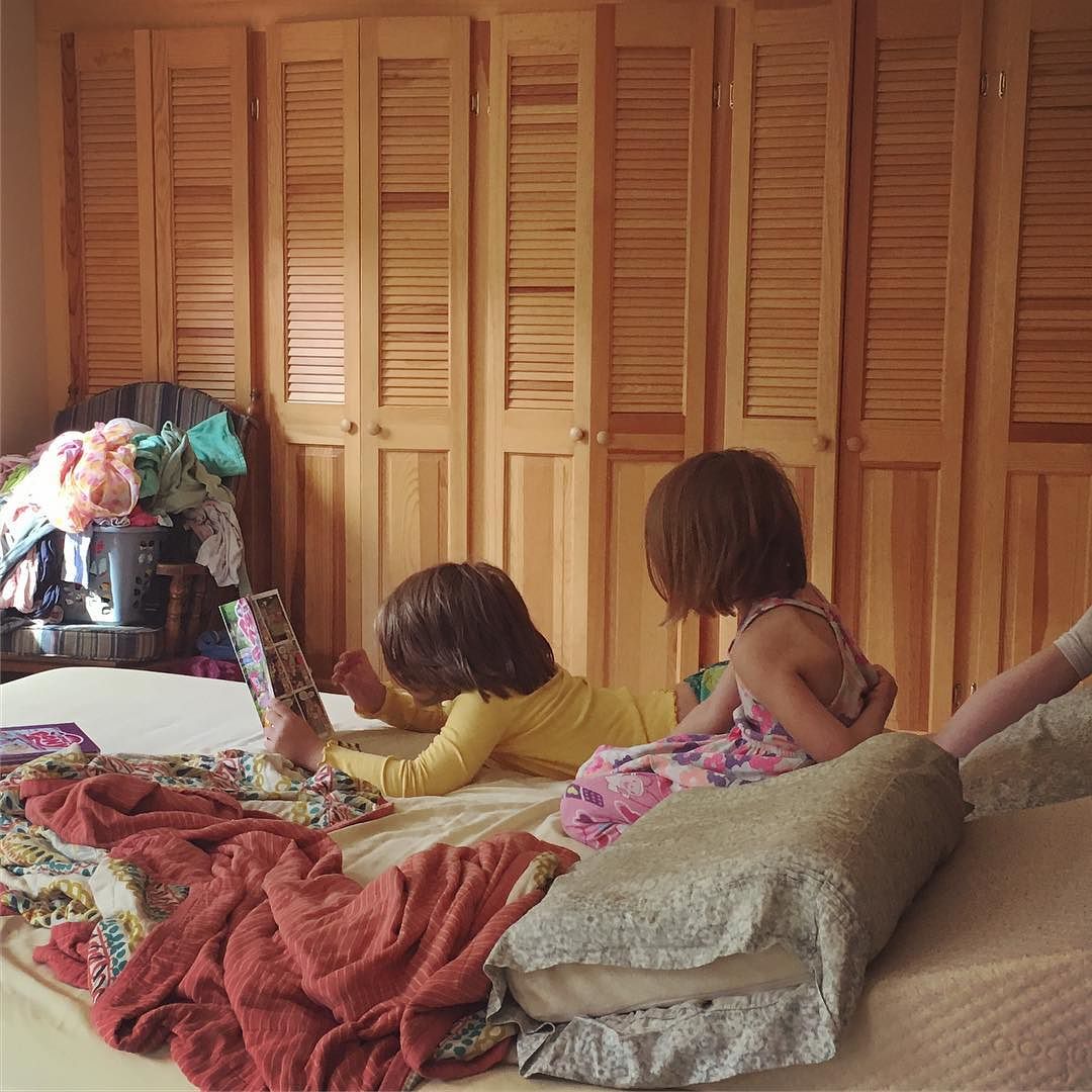 Sisters, reading.