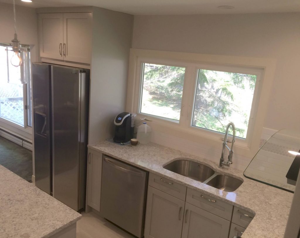 6 kitchen photos (before and after) Wedgewood, Halifax 9 Built in microwave on kitchen island