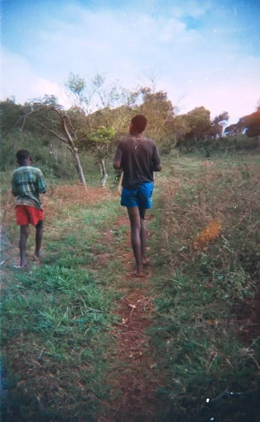 Benty and another relative walking in Jamaica
