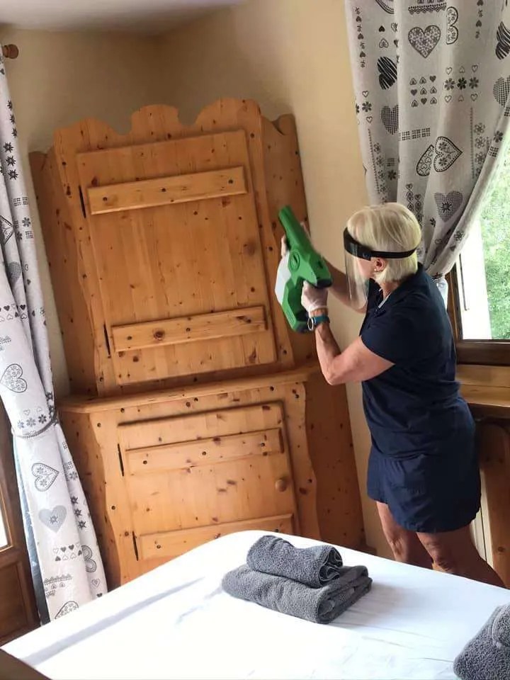 Jane and electrostatic sprayer at Chalet Bluebell