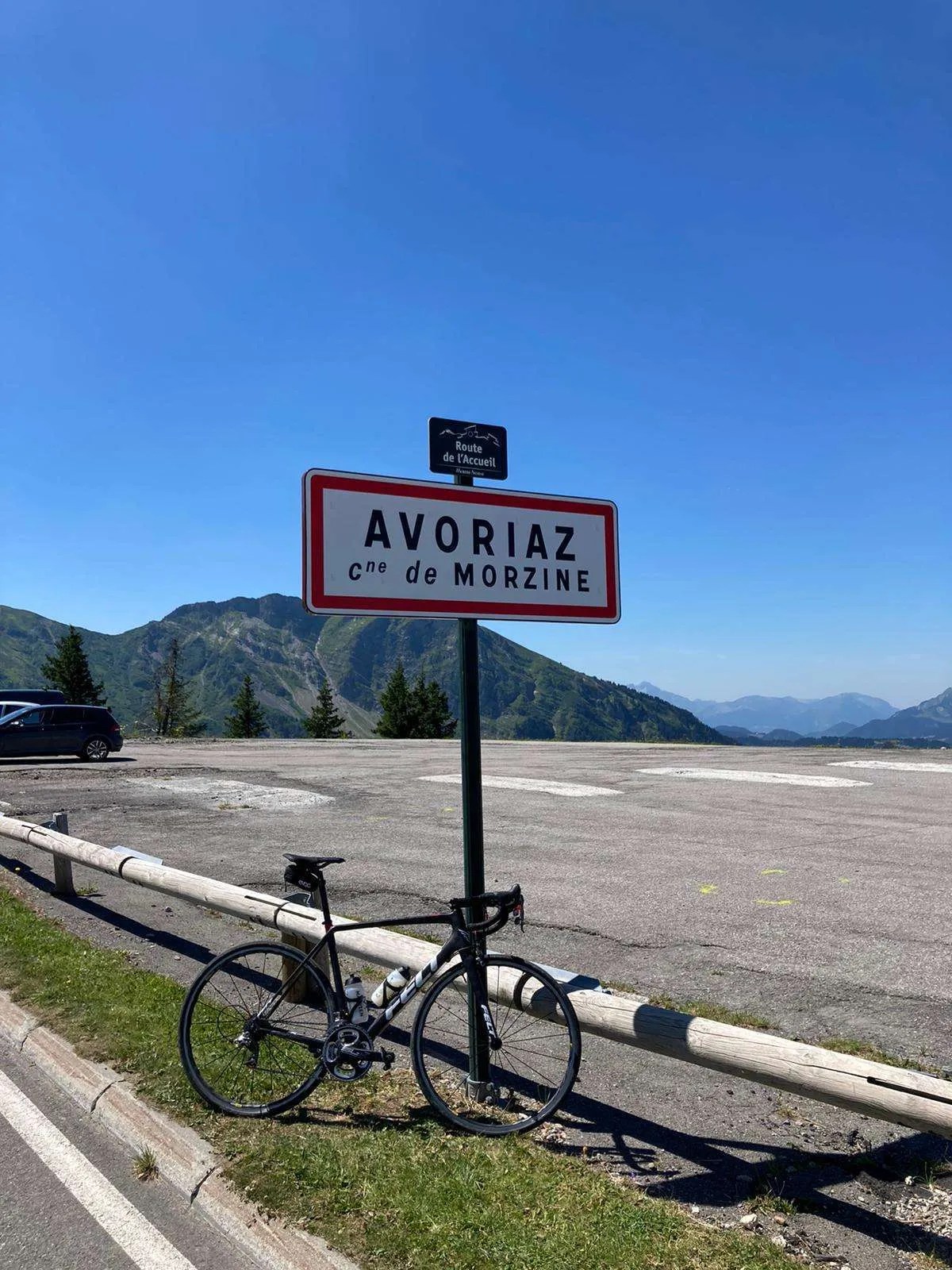 Cycle up to Avoriaz, picture of Avoriaz sign and a road bike