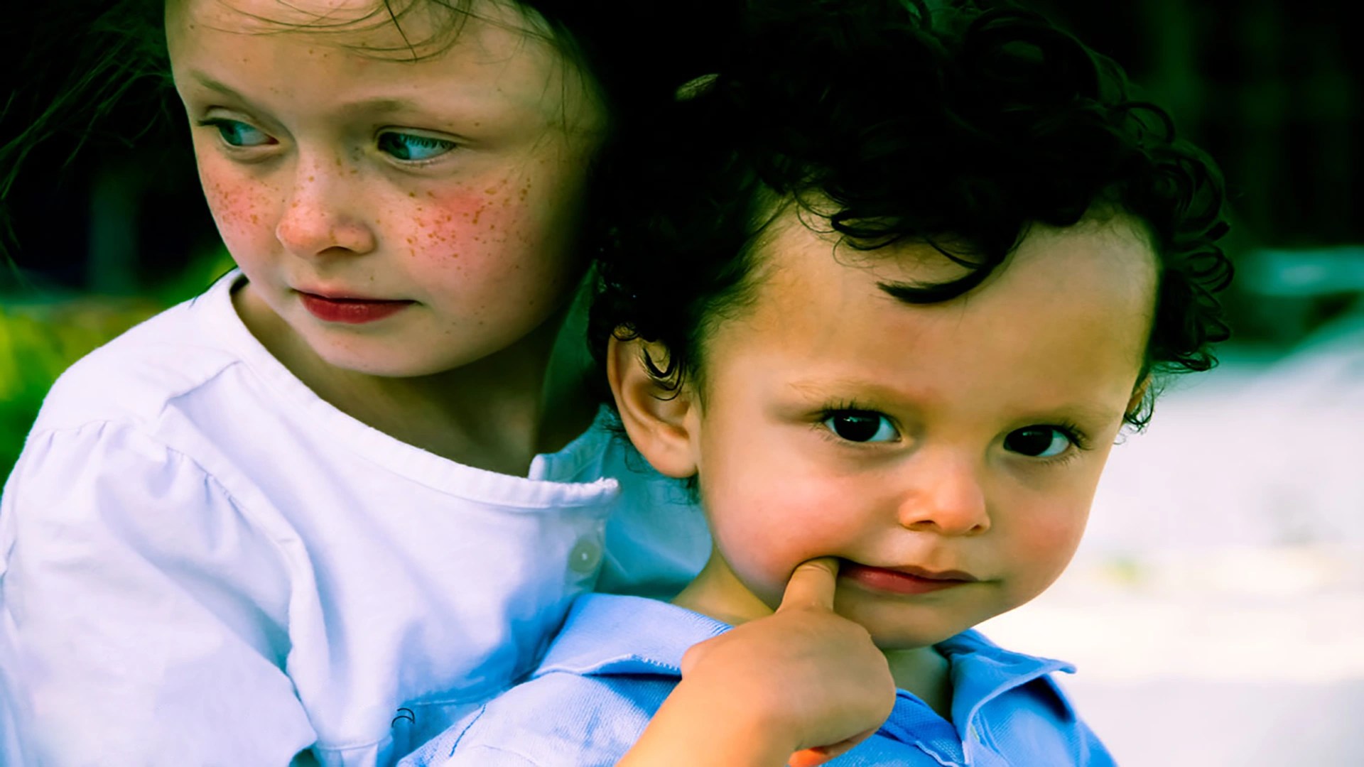 Boy with finger in his mouth