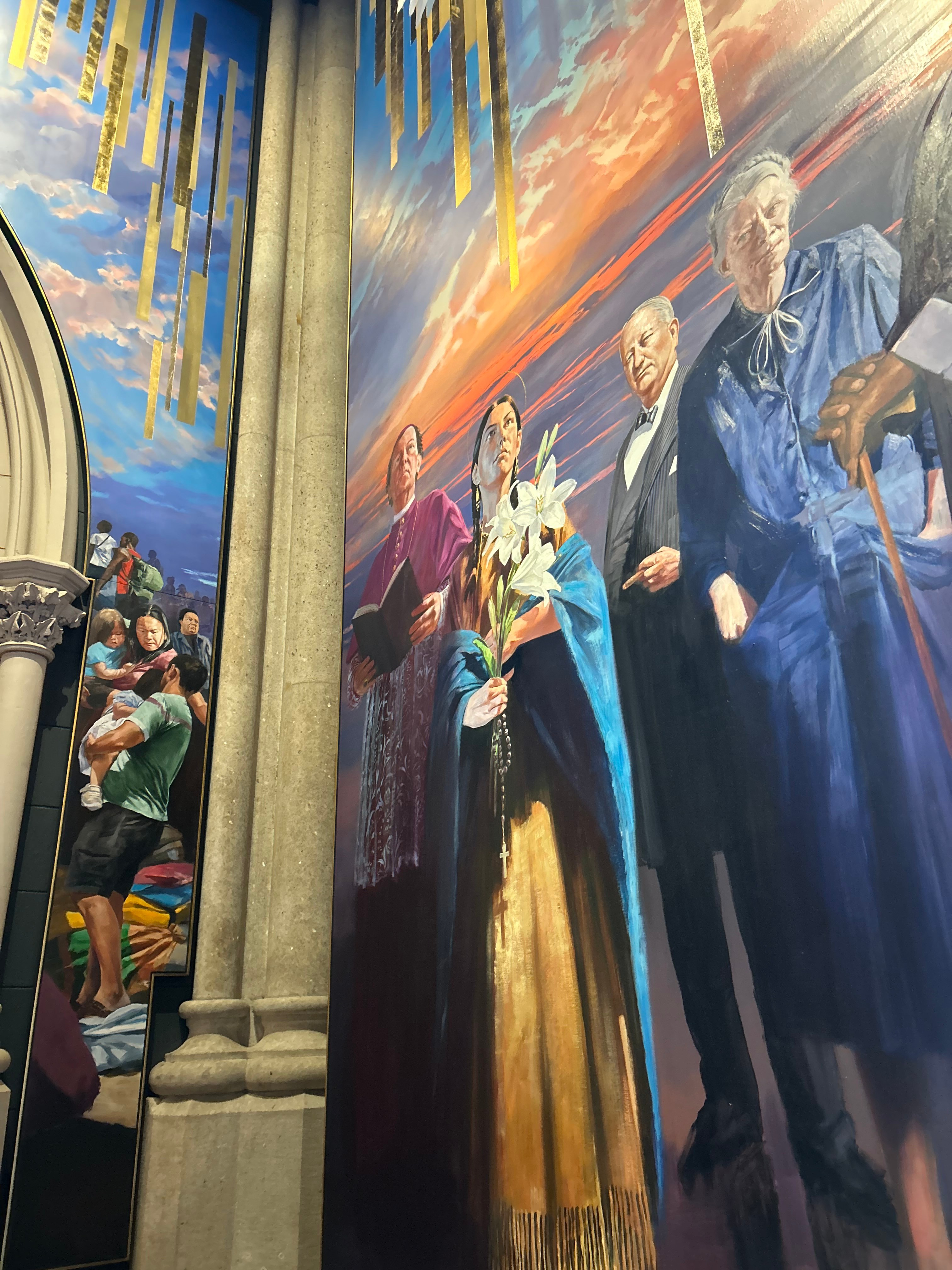 A large painting of figures in a church setting