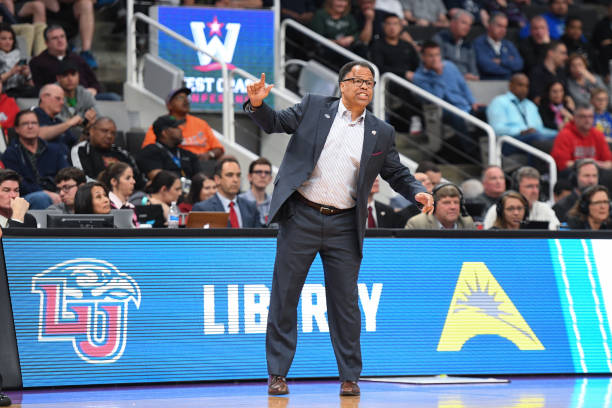 Ritchie McKay on the sidelines during a Liberty basketball game.
