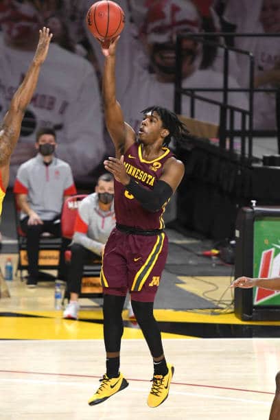 Marcus Carr shoots floater during game.