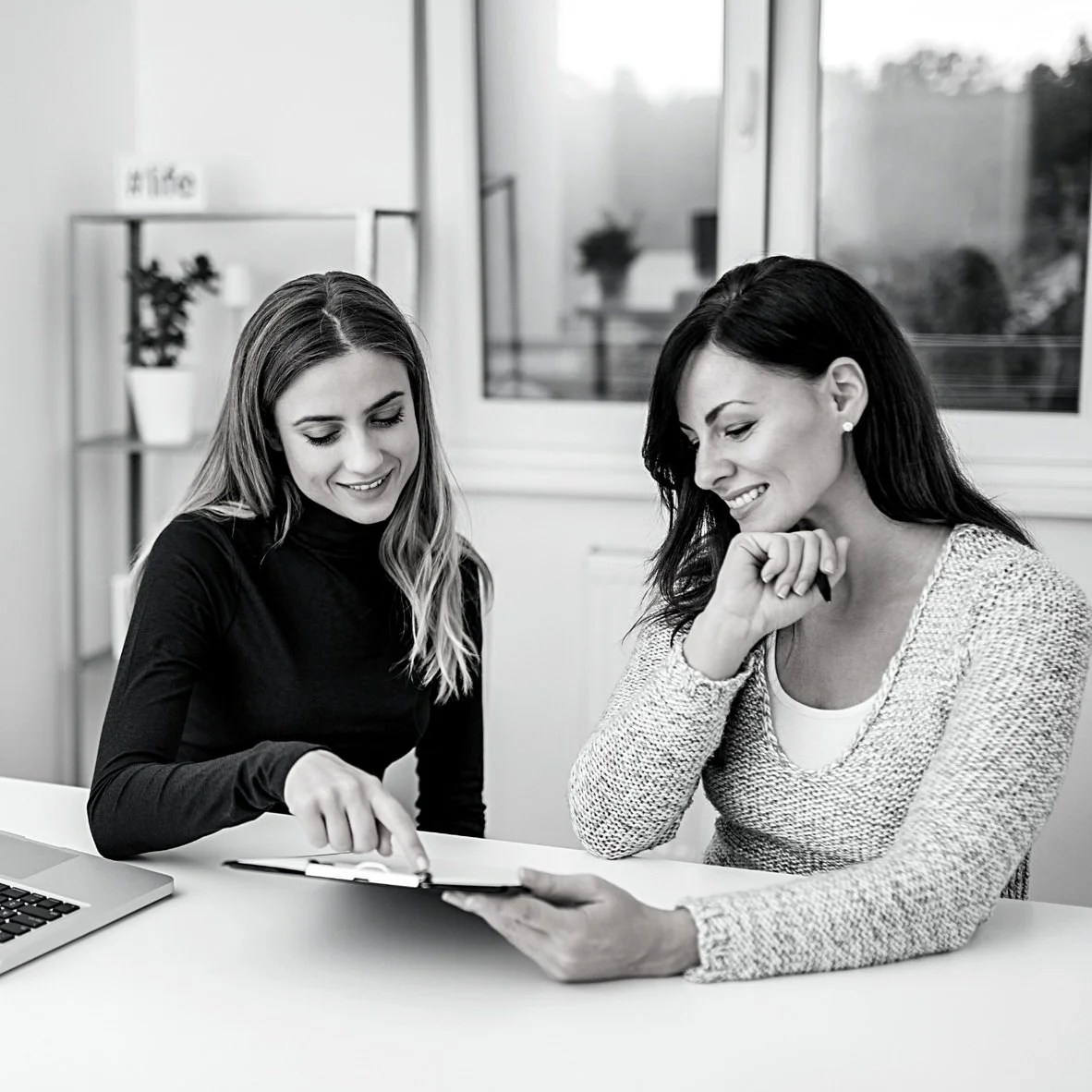 Two consultants working together
