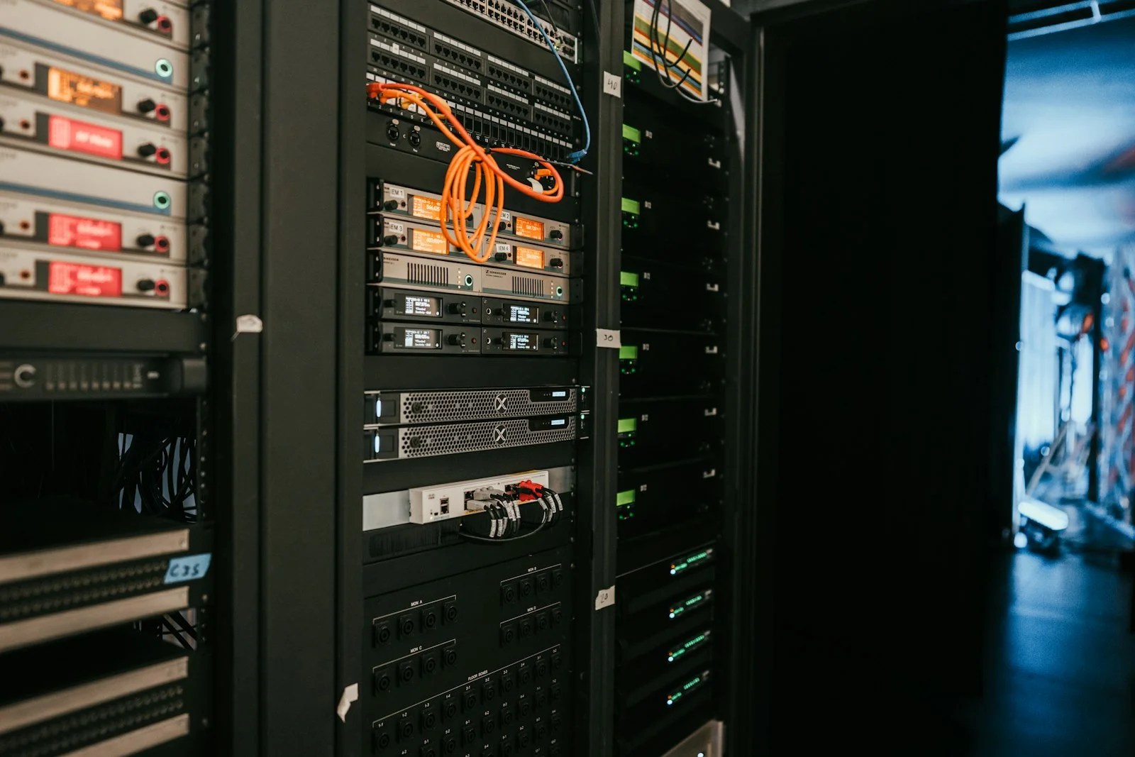 Cloud engineer interview questions guide illustrated by a rack of servers in a data centre