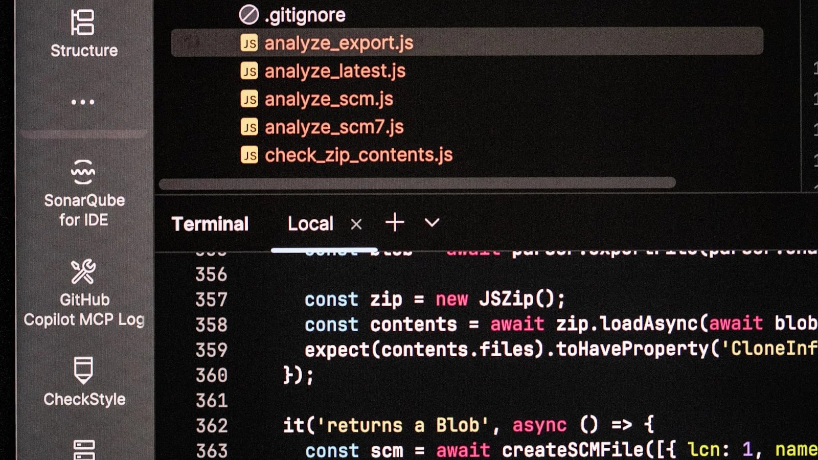 Claude Code Review analysing code and terminal output on a developer screen