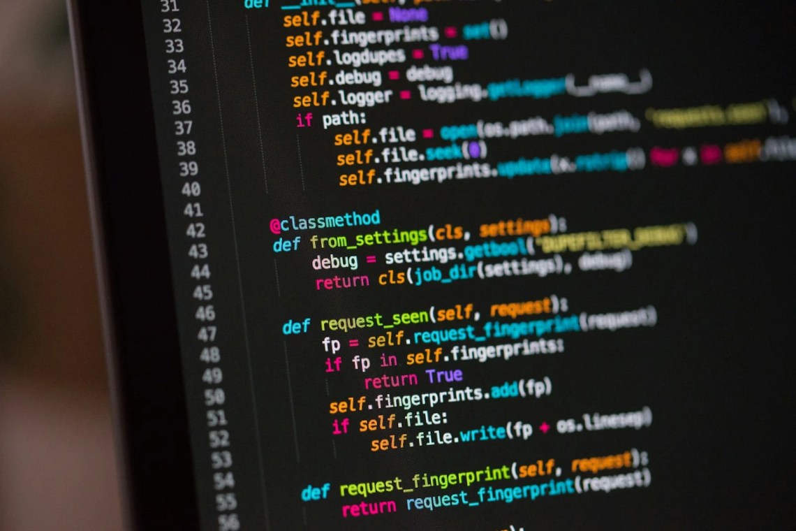 Cursor vs Claude Code compared on a developer screen showing code in an editor