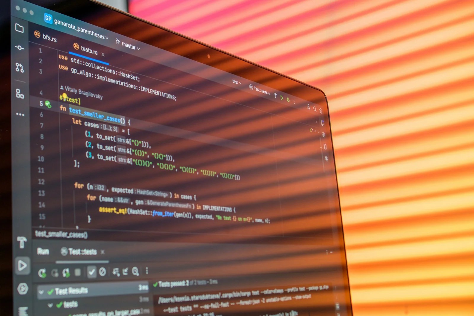 Data engineer interview questions guide showing a laptop screen with code