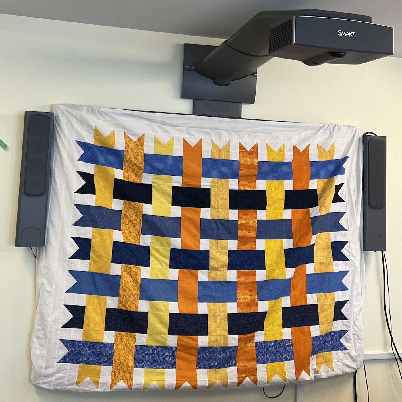 Smartboard screen with a quilt covering