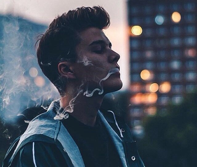 Free Gambar Japanese Man Lighting A Cigarette Outside In The City Stock Photo Terbaru by Lampunghits.com