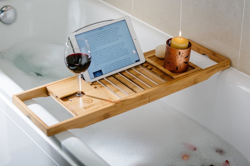 This bathtub caddy has been made with 100% natural bamboo wood. 5 Bamboo Bathtub Caddies that You Can Buy Right Now!
