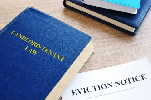 Legal textbook and formal eviction notice