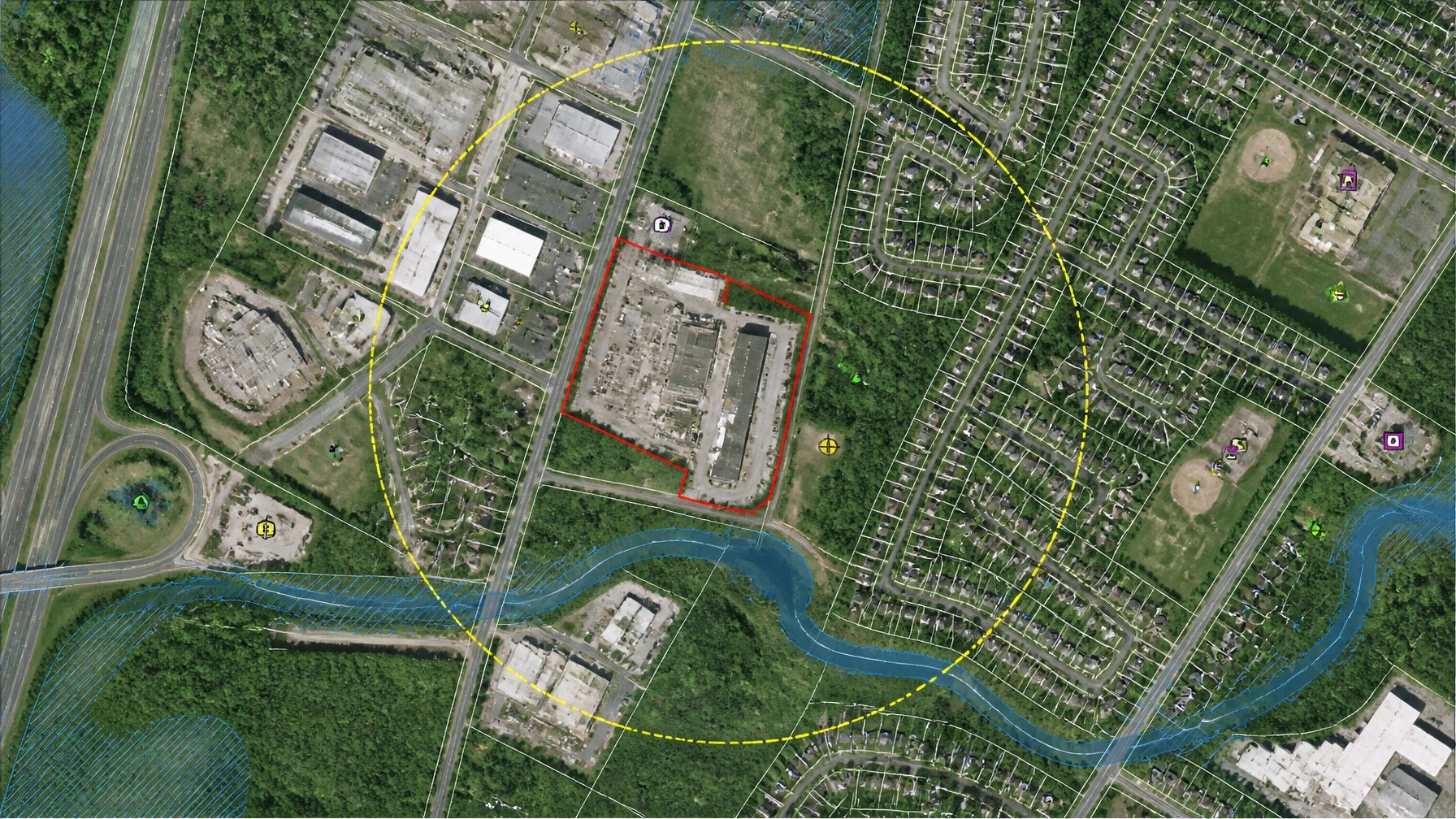 Detailed GIS-style surrounding land-use and receptor screening map with parcel boundaries, 2,000-foot well search radius, nearby buildings, and surface water features