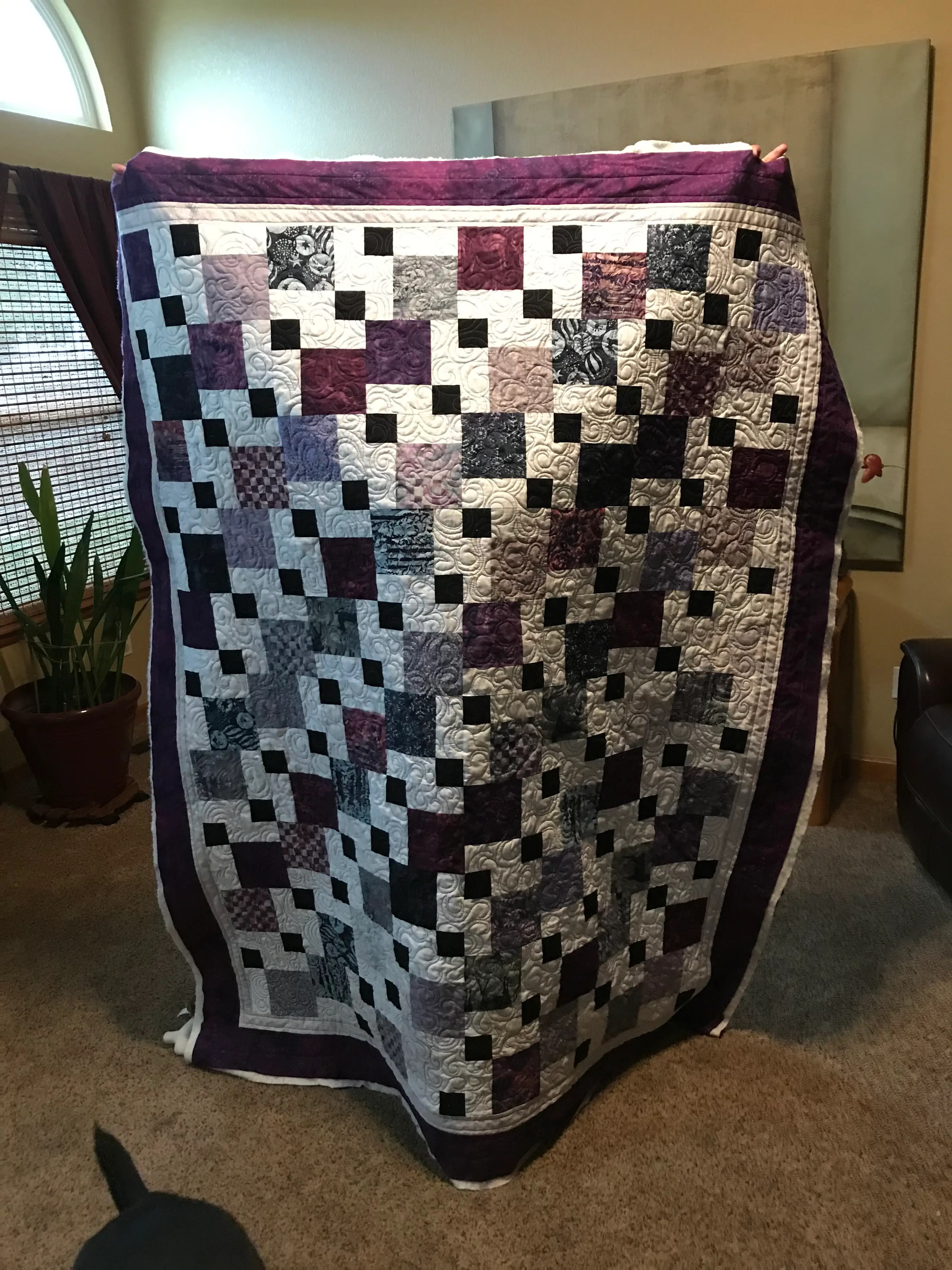 Modern sampler quilt top in aqua, coral, purple, and mint
