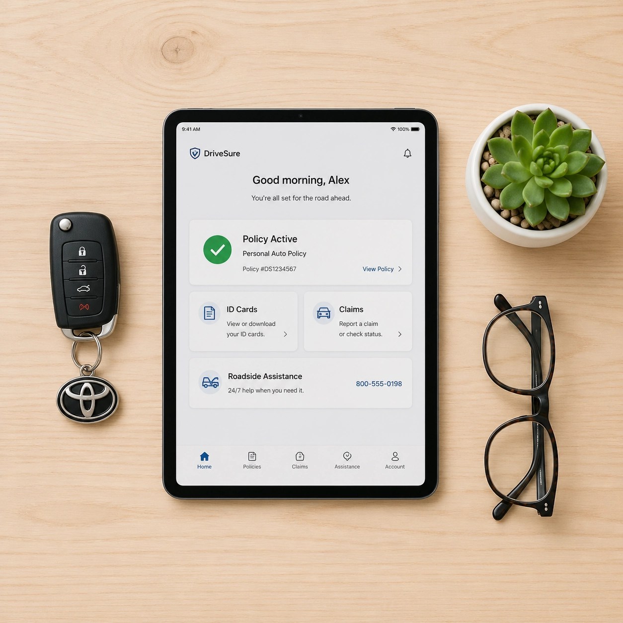 Organized workspace with a tablet and keys representing preparation for a medical appointment.