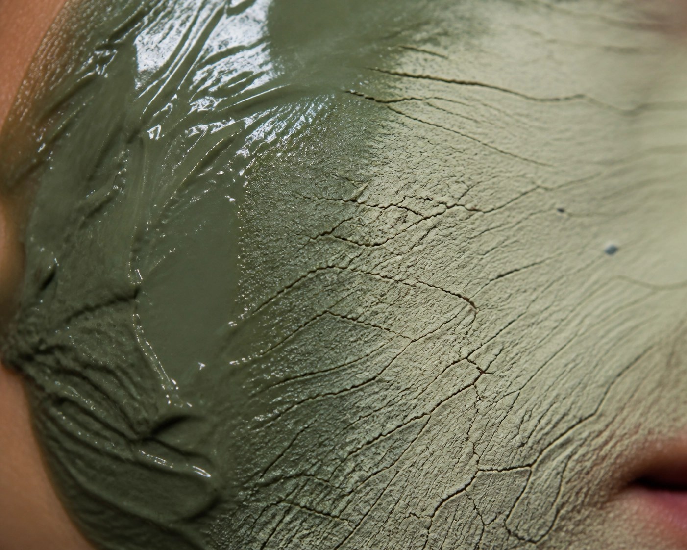 Detailed view of Clayer French Green Clay drying on skin during the mineral exchange recovery process.
