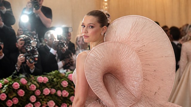 Model in sculptural art-inspired eveningwear at a museum gala