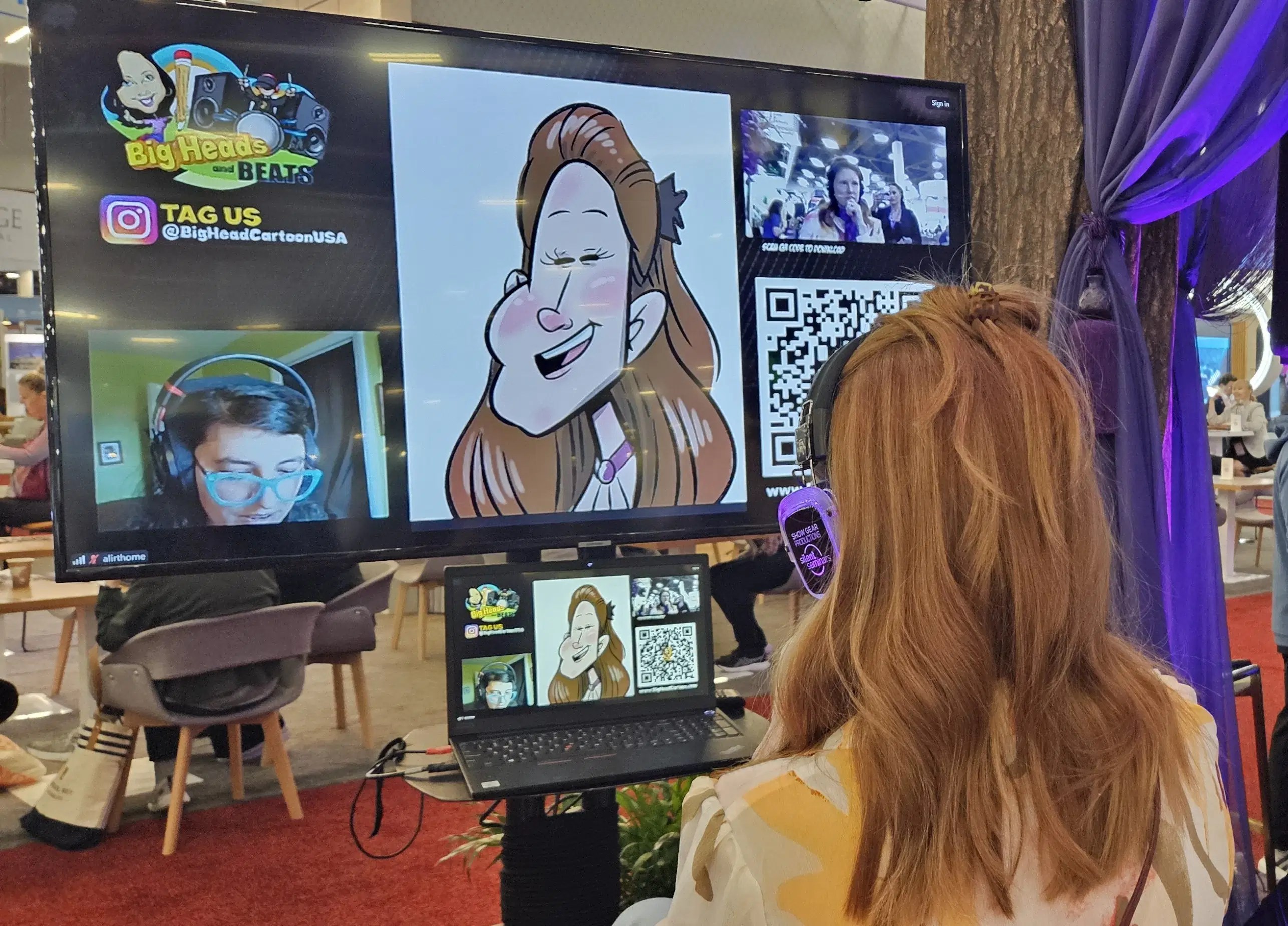 A guest interacting with a remote caricature artist, illustrating how Big Head Cartoon bridges the gap between remote and in-person teams during hybrid events.
