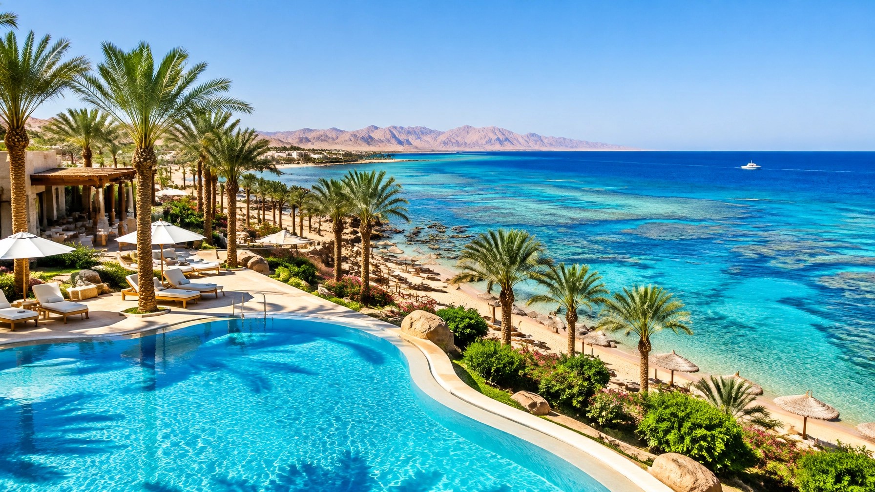 Sunny October all-inclusive resort on Egypt’s Red Sea with turquoise water, coral reef and palm shadows