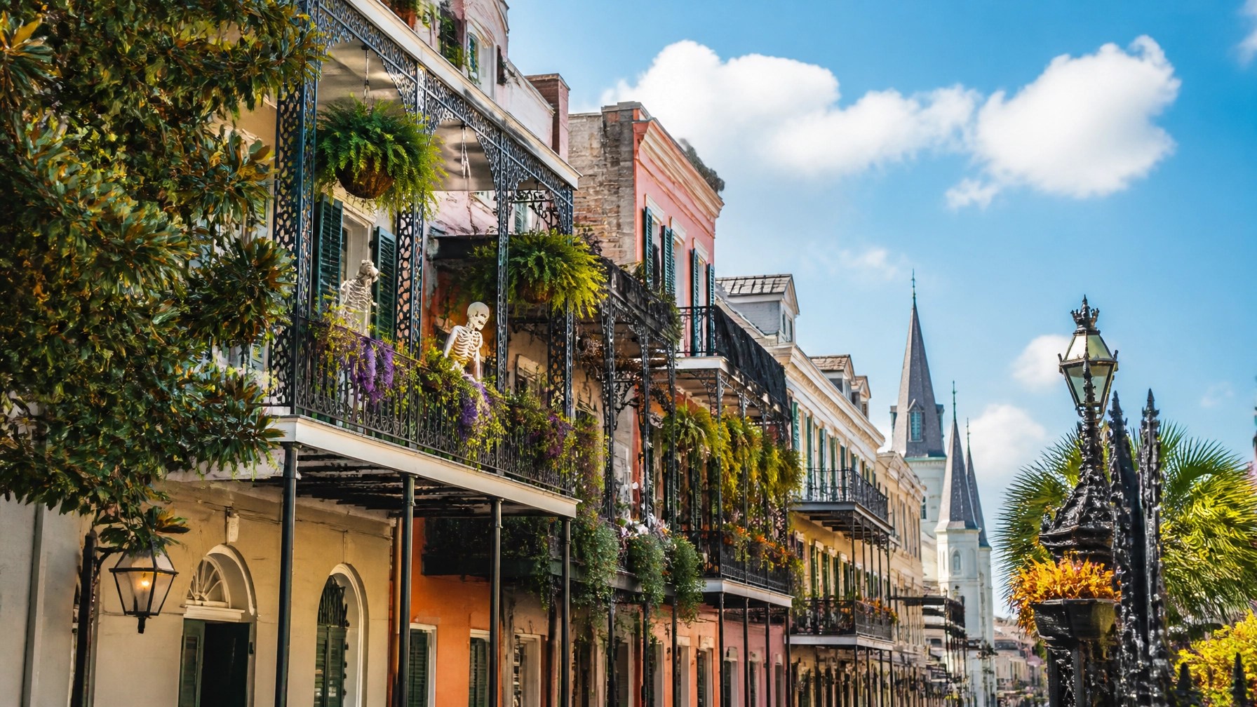 Vibrant New Orleans French Quarter in daylight with elegant Halloween details