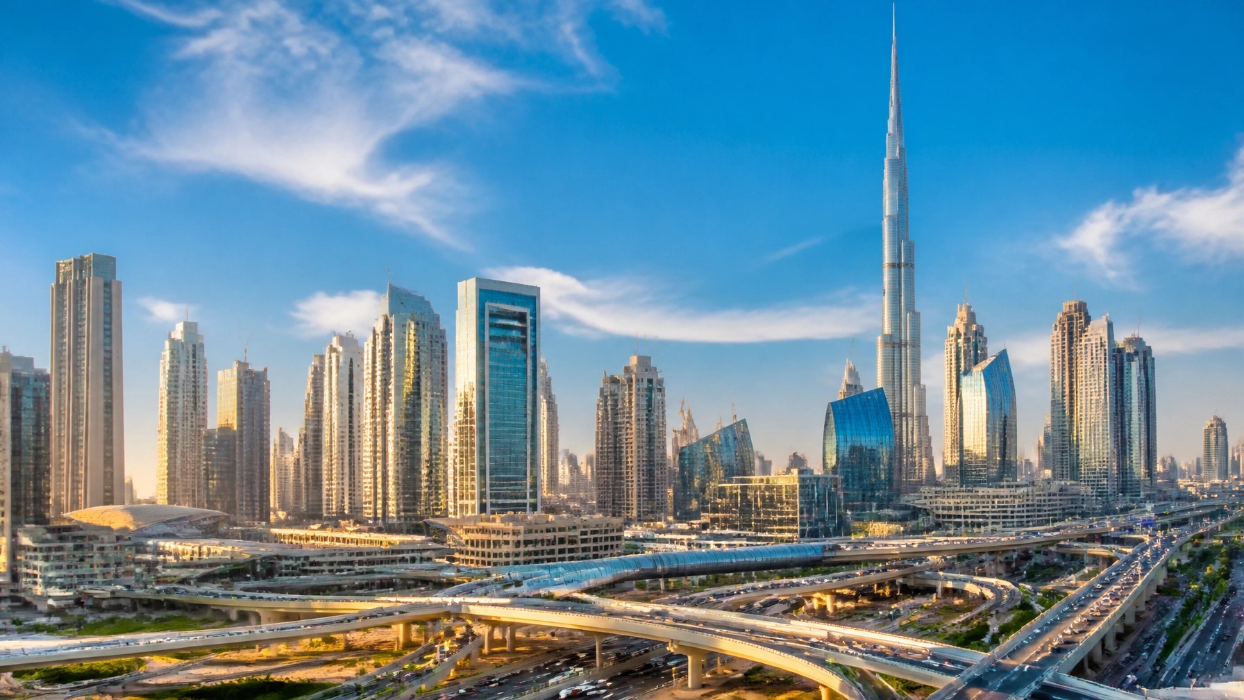Futuristic skyline of Dubai under brilliant bright blue daytime sky