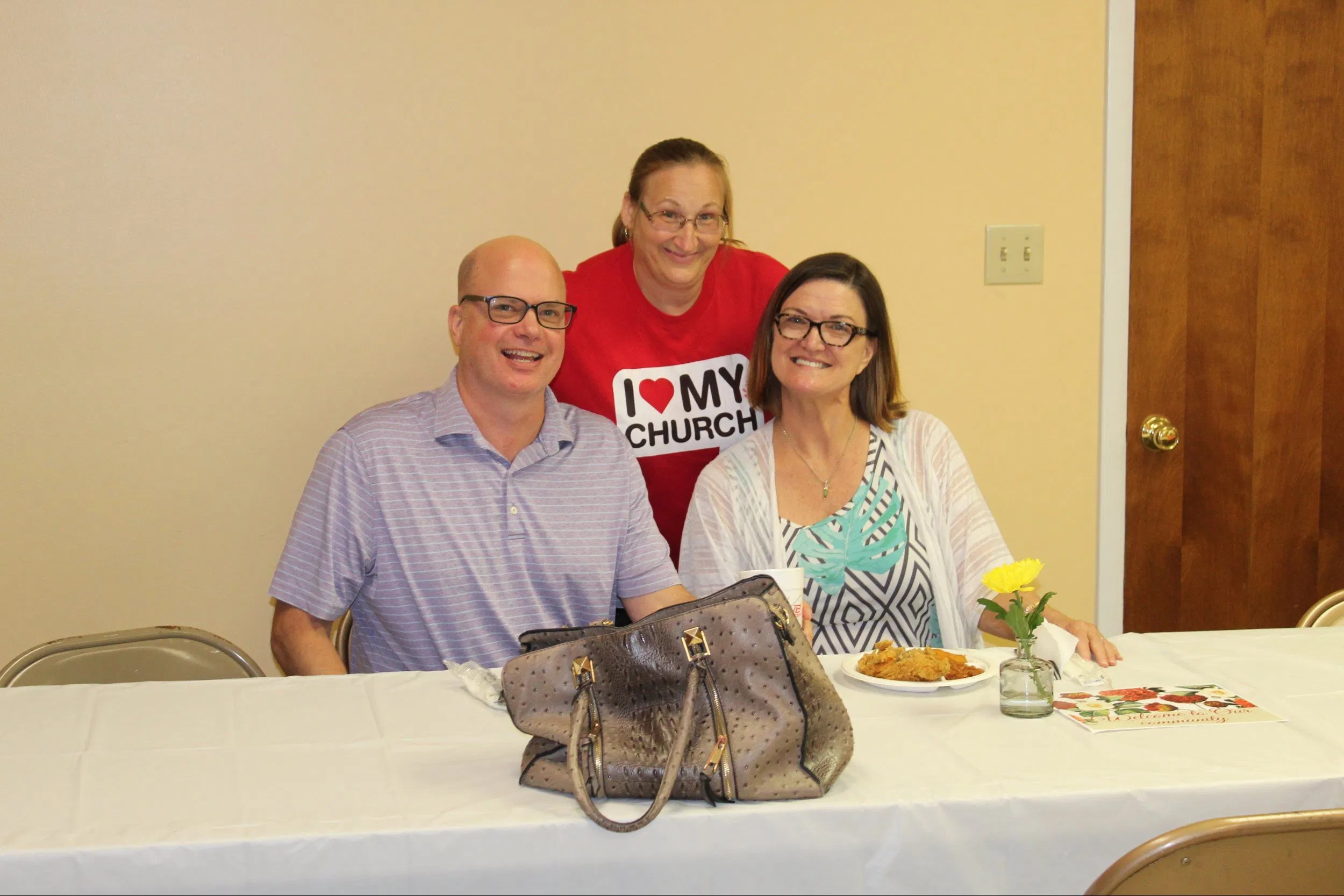 Church members enjoying fellowship and a meal together