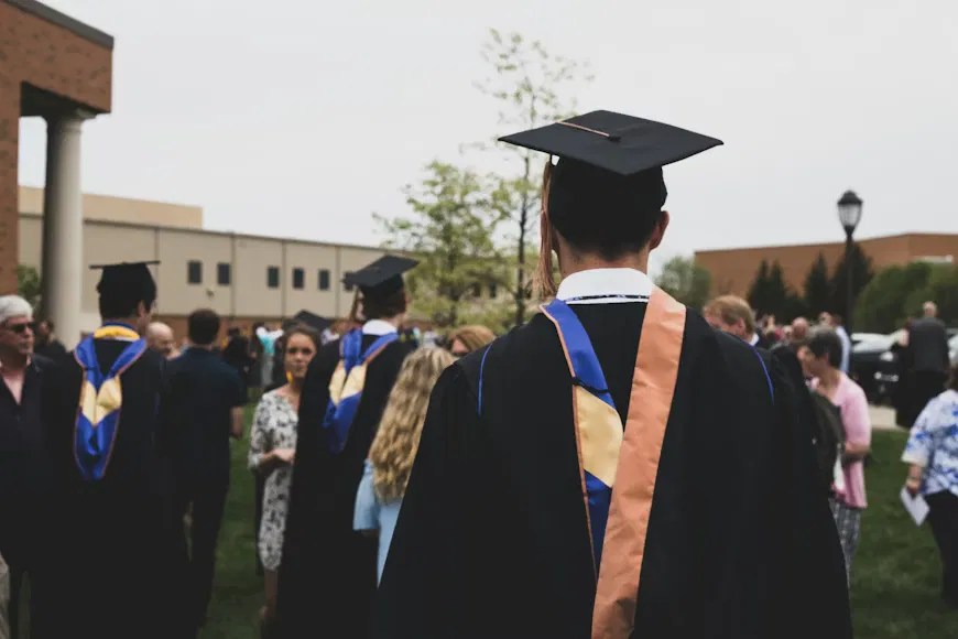 Graduates symbolizing professional pet certifications