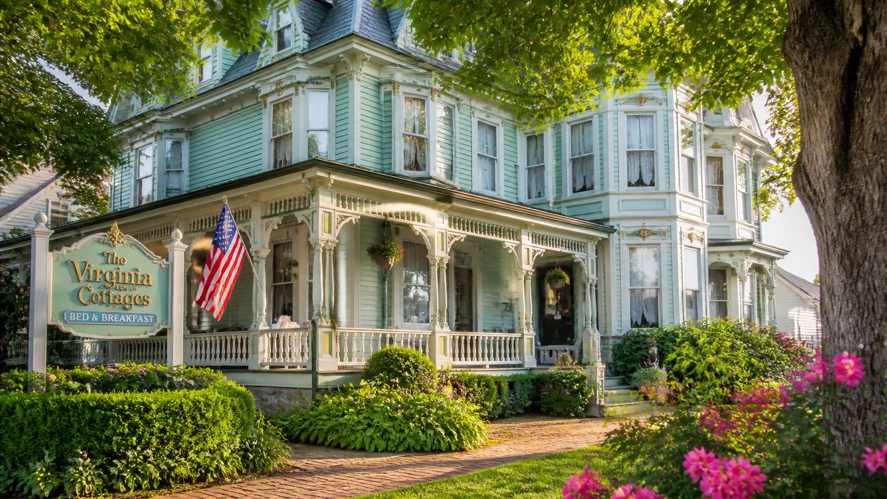 Historic Victorian Painted Lady inn with beautiful gardens in Cape May, New Jersey.