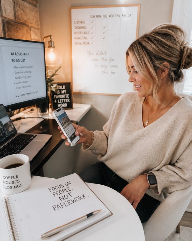 A real estate agent using her phone to manage her business while staying relaxed.