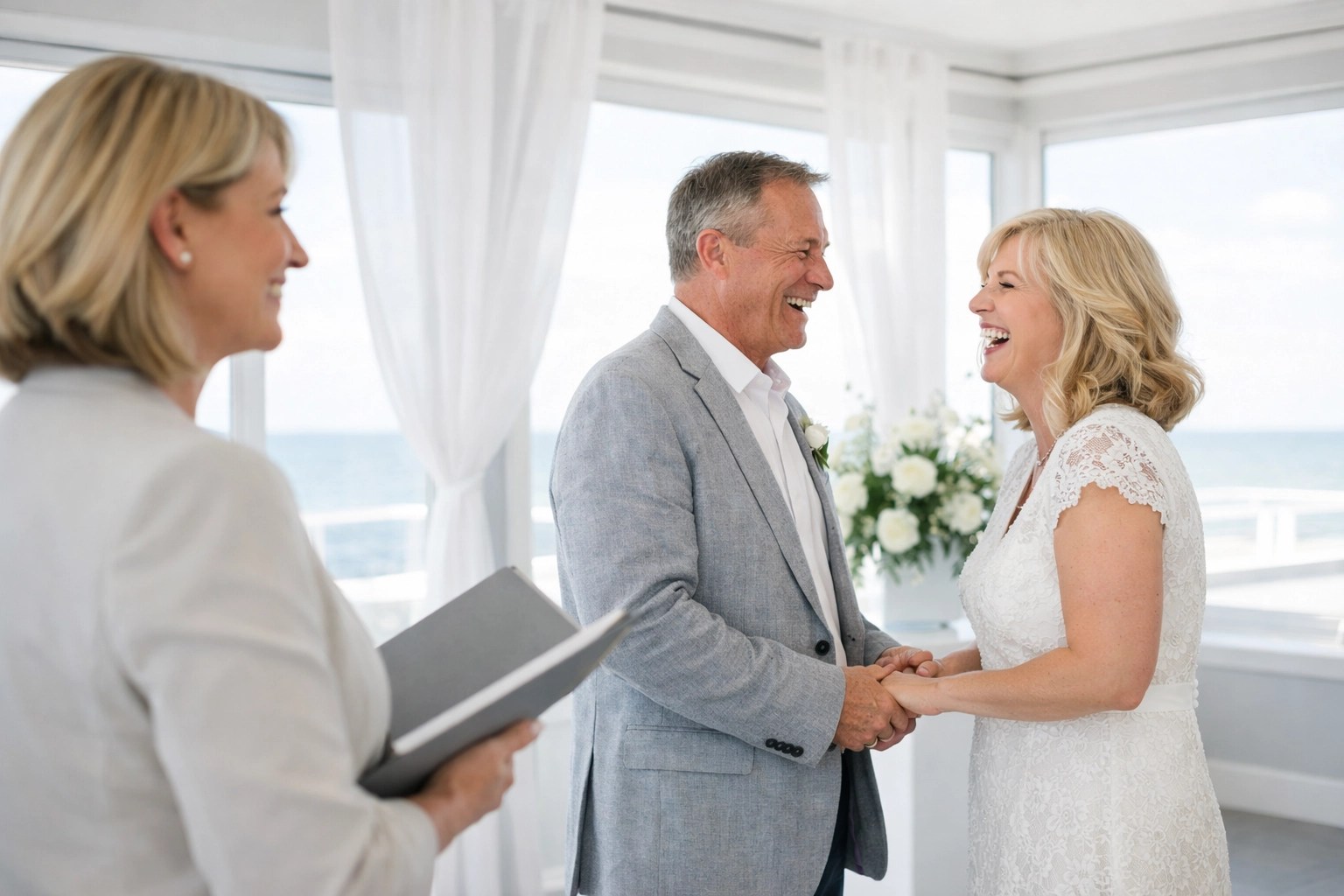 A joyful Kent vow renewal ceremony at a coastal venue led by a professional wedding celebrant.